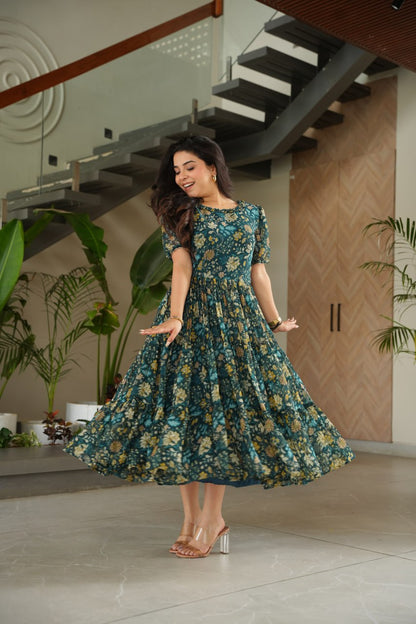 Green color georgette printed gown 