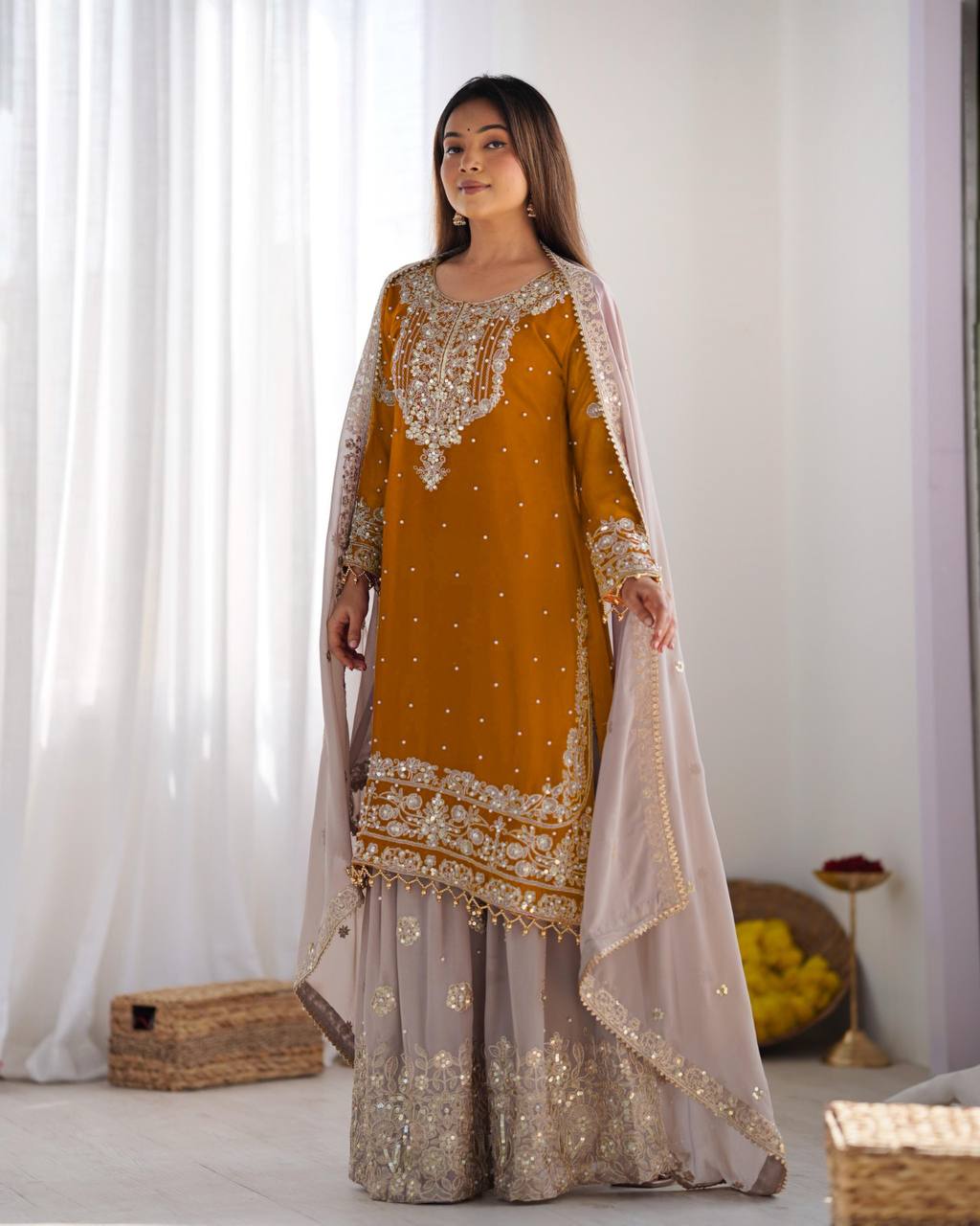 Yellow color georgette sharara suit with dupatta 
