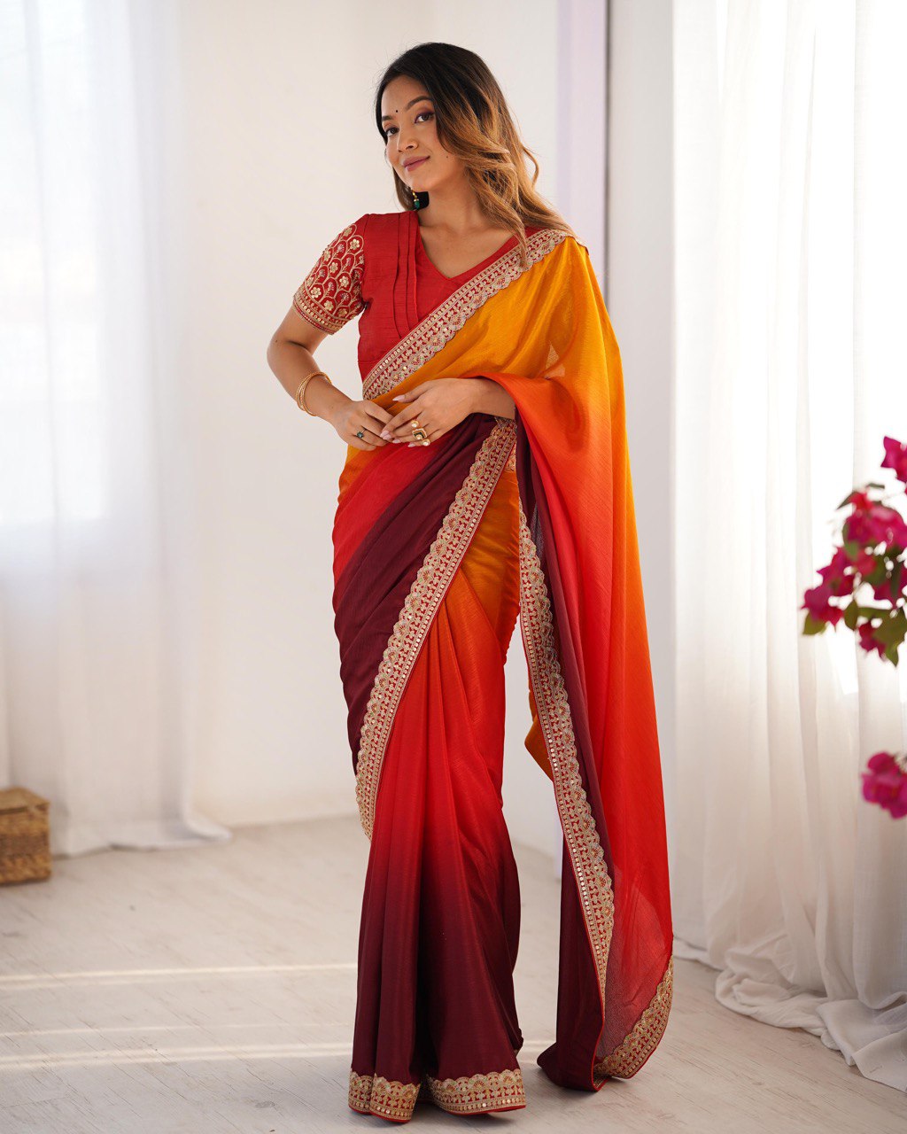 Orange color chinon silk saree for party