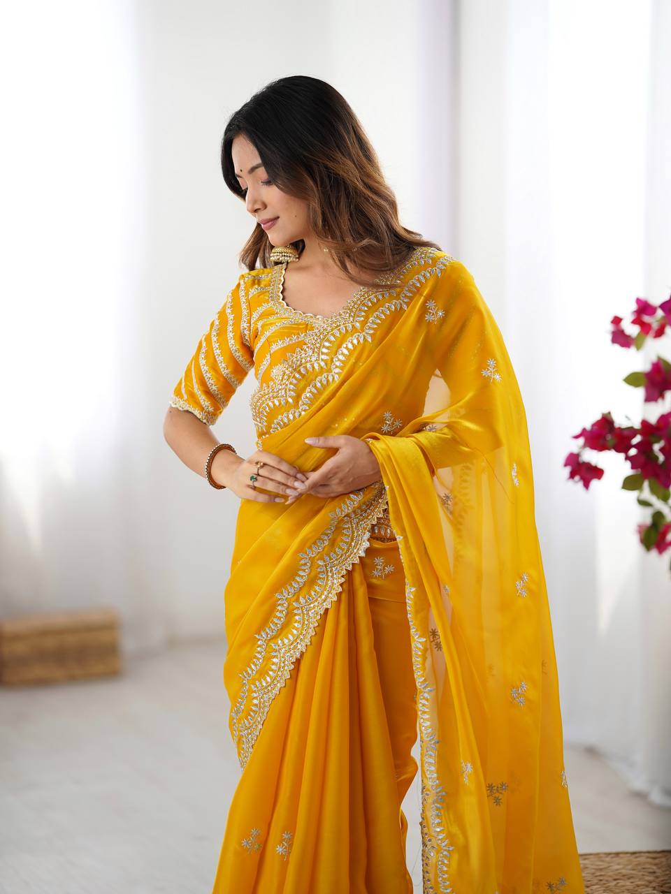 Yellow color jimmy choo saree with blouse price
