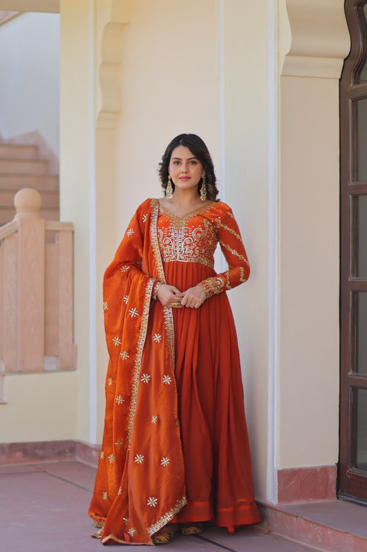 Orange color fendy gown for women