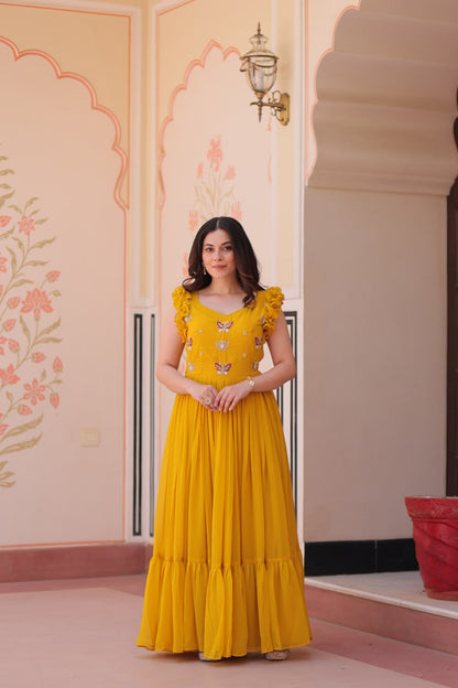 Yellow color faux blooming gown for women
