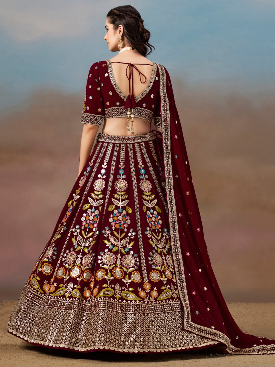 Reception wear maroon color chaniya choli 