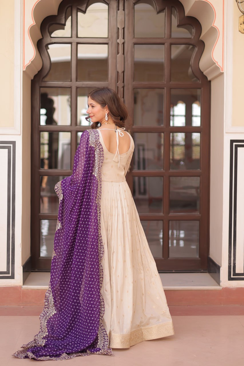 Off white color jacquard gown with sleeves
