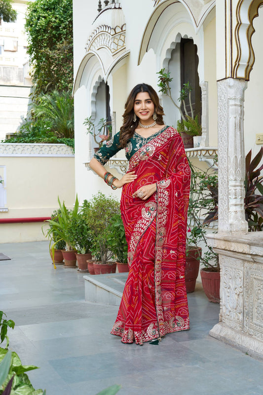 Red color bandhej saree with blouse