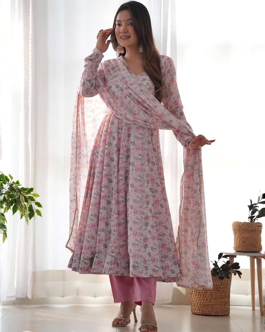 Women pink color chiffon gown
