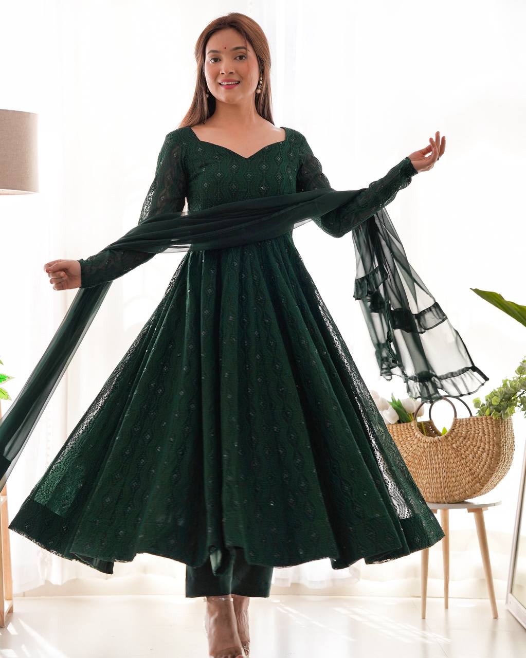 Dark green color georgette gown
