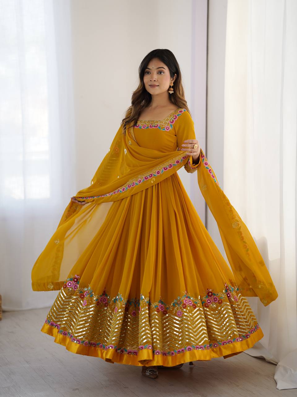 Yellow color georgette gown for party