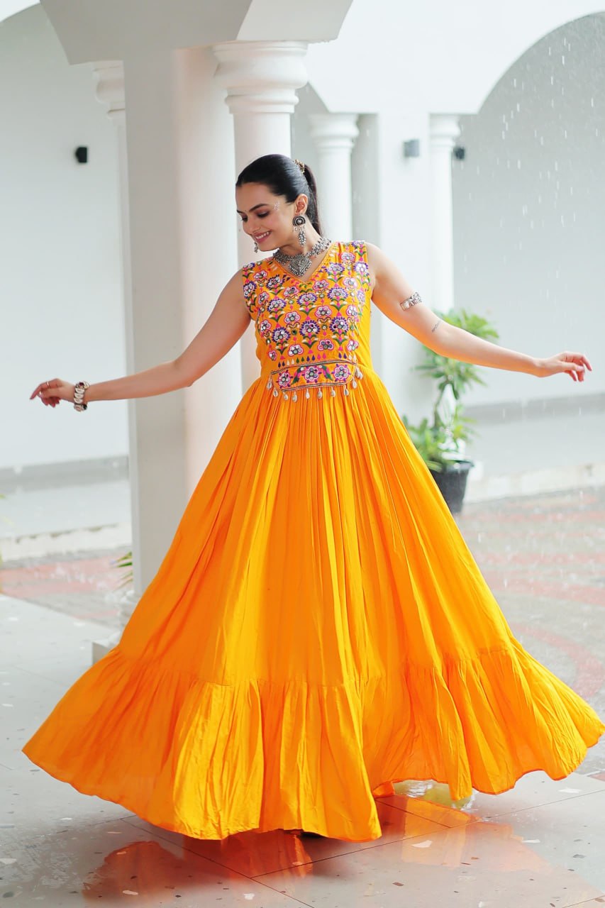 Yellow color rayon gown for haldi