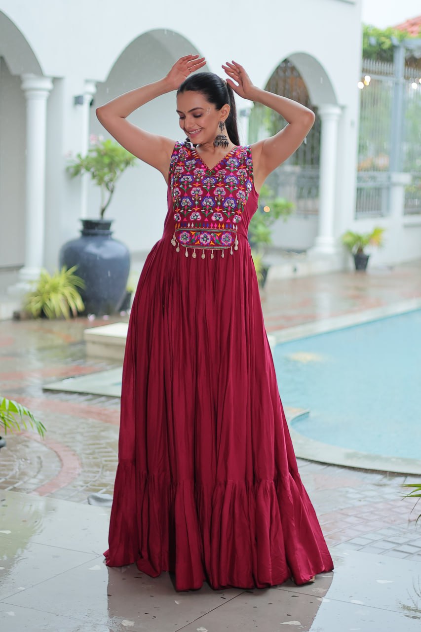 Maroon color designer gown