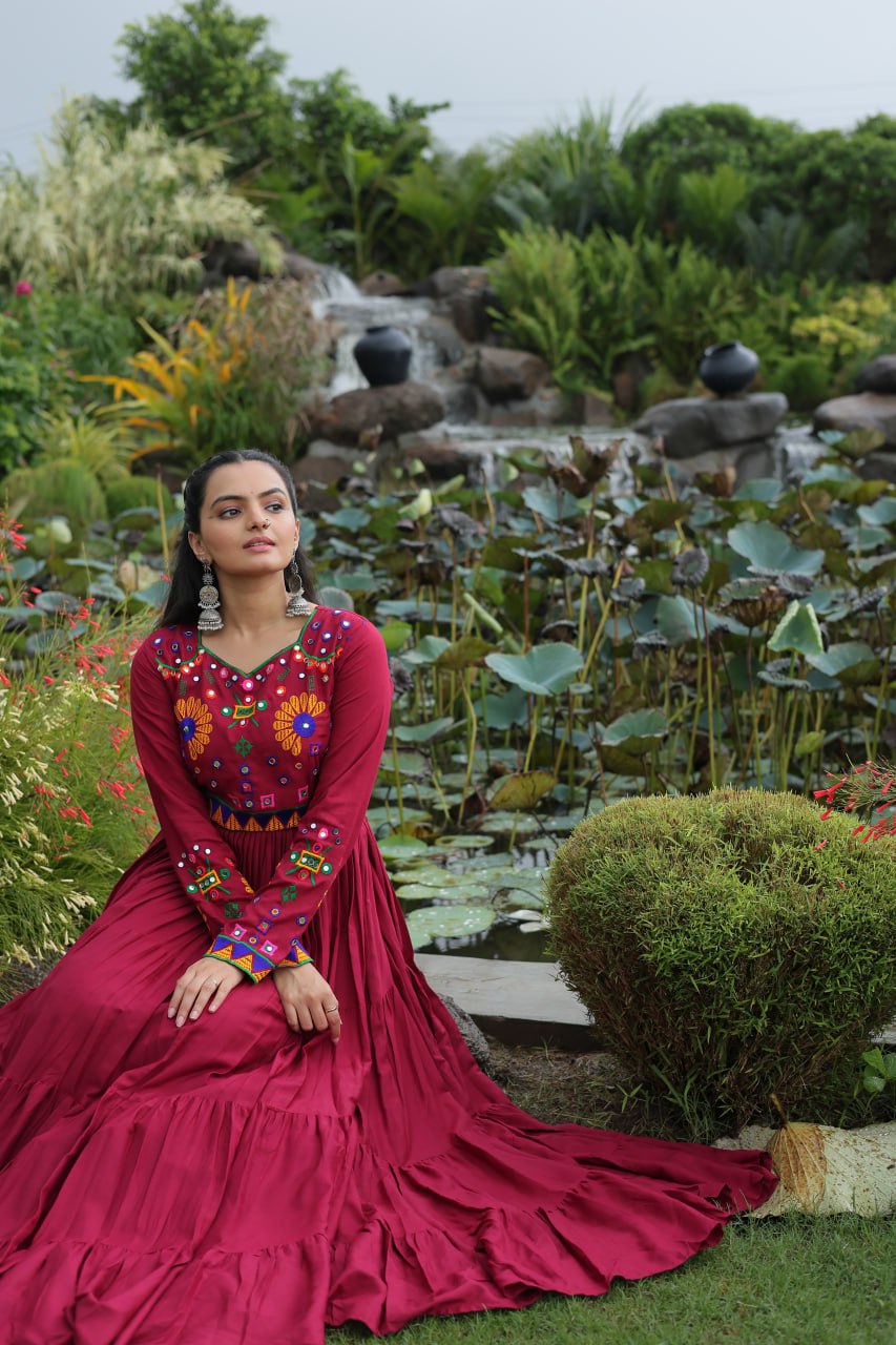 Maroon color designer long gown 