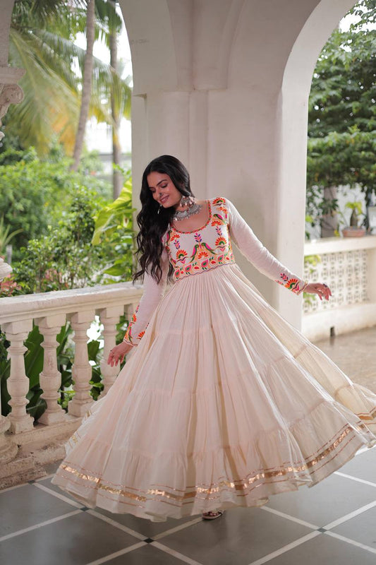 White color embroidery work long gown 