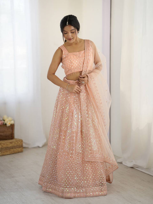 Peach color net lehenga for women