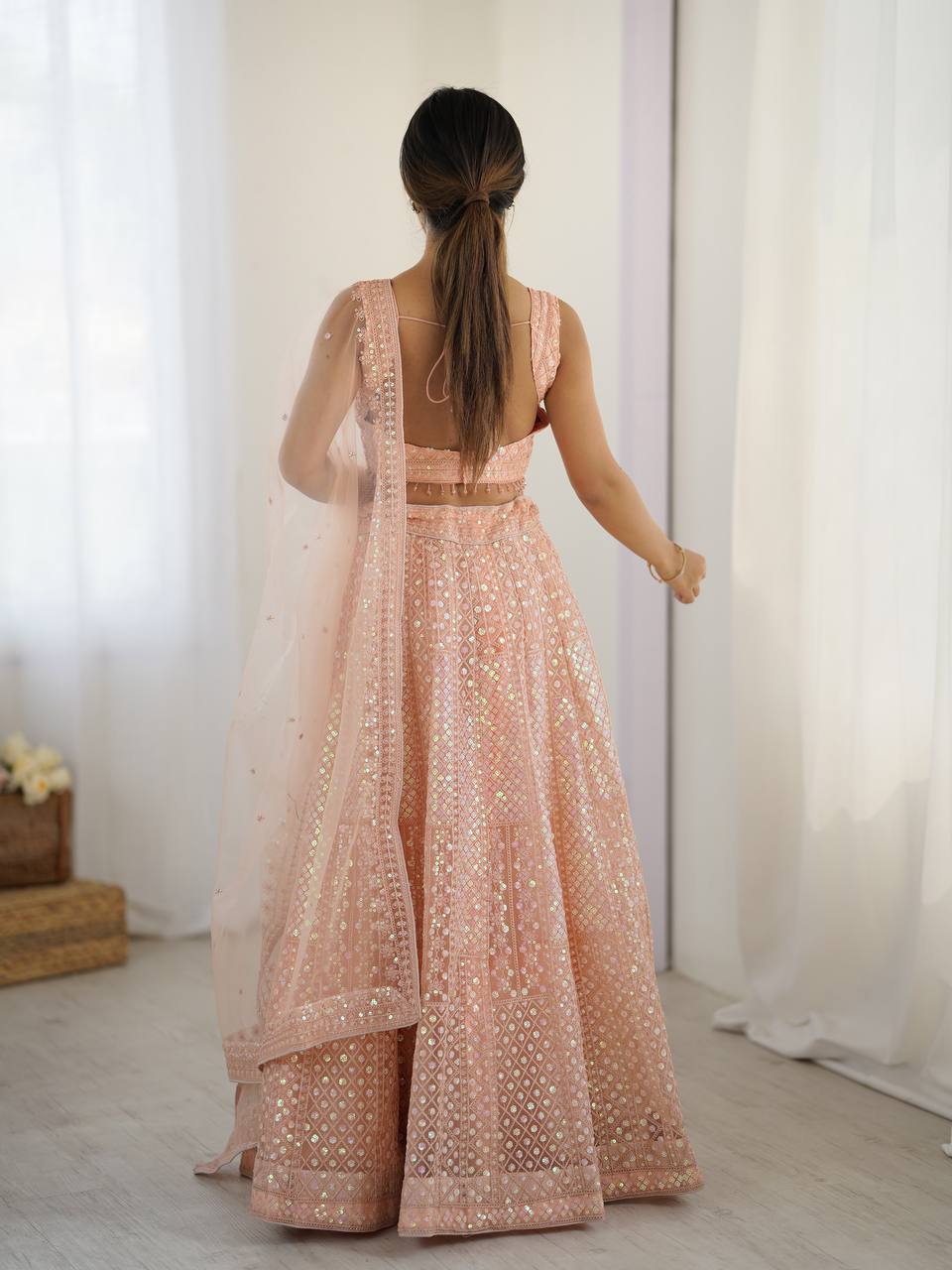 Peach color dori work lehenga in USA