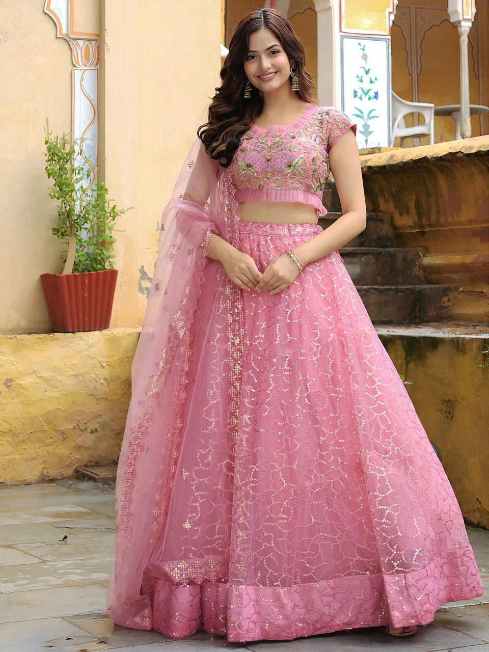 Pink Soft Net Sequins Work Reception Wear Lehenga Choli