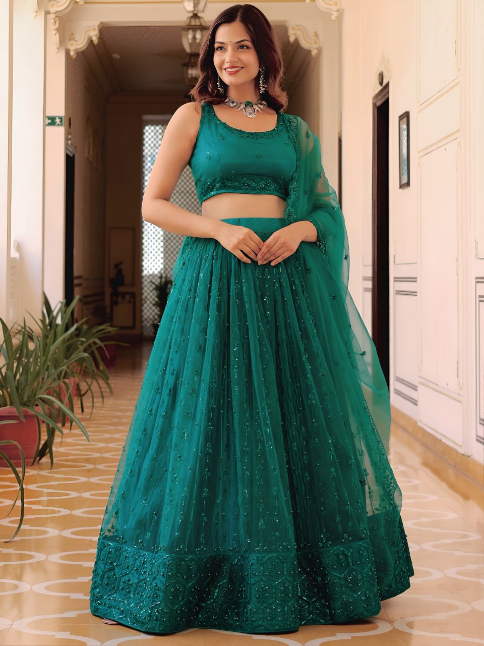 Teal Green Soft Net Sequins Embroidered Lehenga Choli