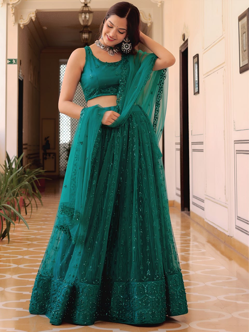 Teal Green Soft Net Sequins Embroidered Lehenga Choli