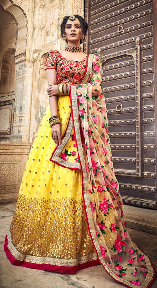 soft net yellow lehenga party wear